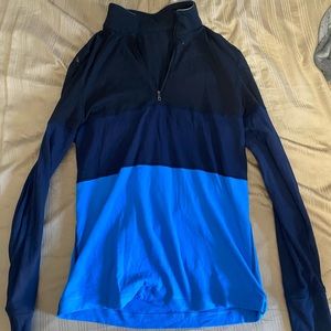 Lululemon zip up long sleeve shirt. Three shades of blue. Perfect condition.